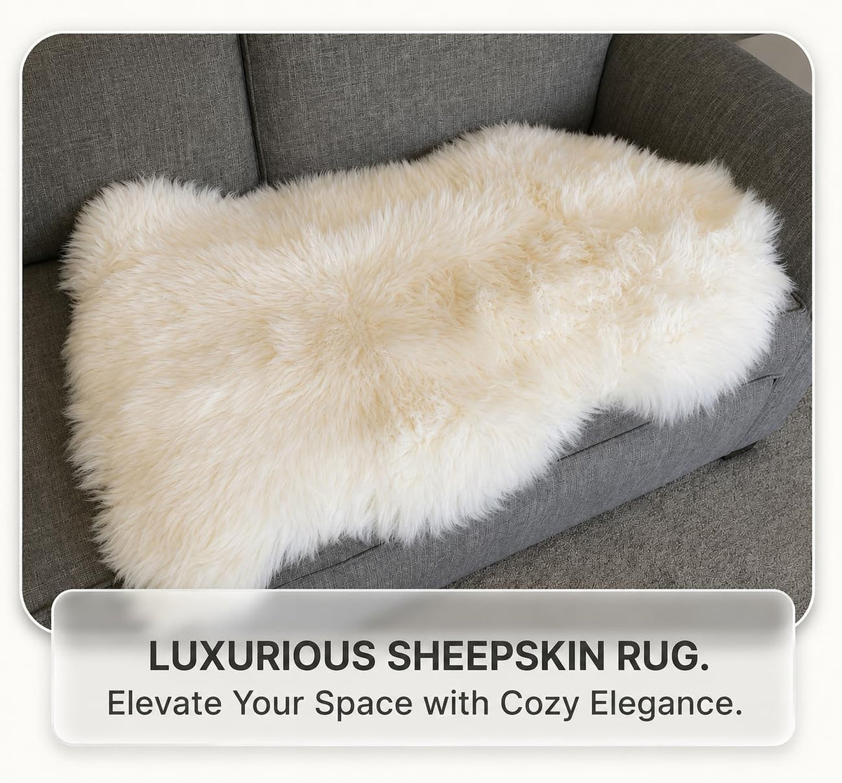Ivory single-pelt sheepskin rug spread across a gray sofa